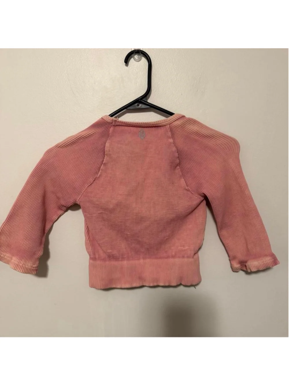 Free People Movement ribbed cropped long sleeve top in a pretty dusty pink/rose